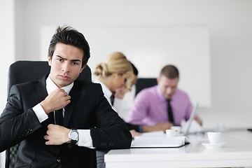 Image showing young business man at meeting