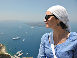 Image showing Greek woman on the streets of Oia, Santorini, Greece