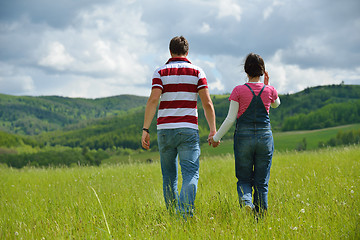 Image showing romantic young couple in love together outdoor