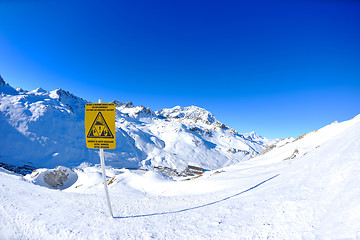 Image showing Sign board at High mountains under snow in the winter