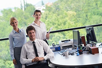 Image showing business people in a meeting at office