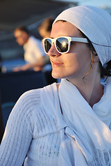 Image showing Greek woman on the streets of Oia, Santorini, Greece