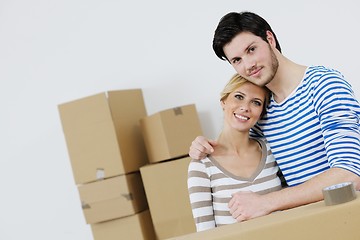 Image showing Young couple moving in new house