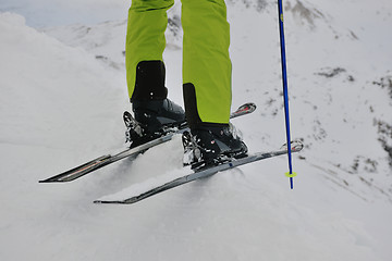 Image showing skiing on fresh snow at winter season at beautiful sunny day