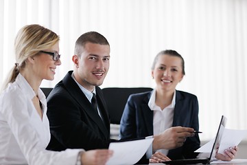 Image showing business people in a meeting at office