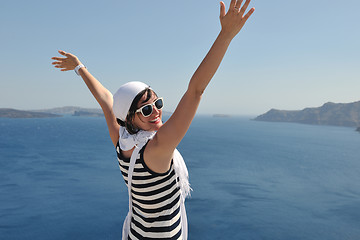 Image showing Greek woman on the streets of Oia, Santorini, Greece