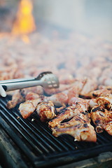 Image showing Barbecue with chicken  grill