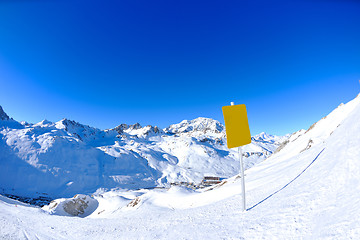 Image showing Sign board at High mountains under snow in the winter