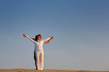 Image showing couple enjoying the sunset