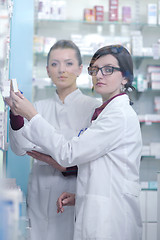 Image showing team of pharmacist chemist woman  in pharmacy drugstore