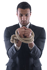 Image showing business man with rope isolated on white background