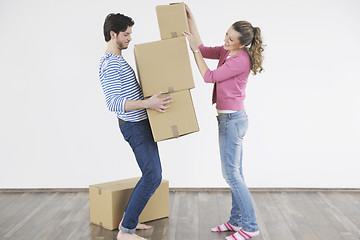 Image showing Young couple moving in new home