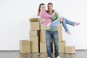 Image showing Young couple moving in new home