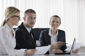 Image showing business people in a meeting at office