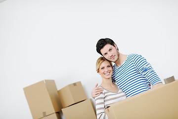 Image showing Young couple moving in new house