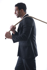 Image showing business man with rope isolated on white background