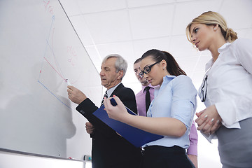 Image showing Senior business man giving a presentation