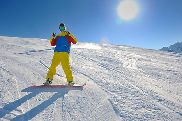 Image showing skiing on fresh snow at winter season at beautiful sunny day