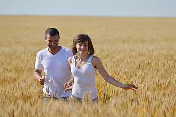 Image showing happy couple in wheat field