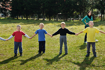 Image showing preschool  kids outdoor have fun