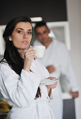 Image showing Young love couple taking fresh morning cup of coffee