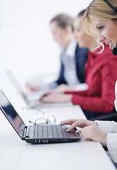 Image showing business woman group with headphones