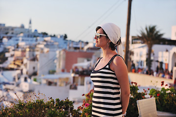 Image showing Greek woman on the streets of Oia, Santorini, Greece