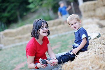 Image showing woman and child have fun outdoor