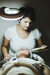 Image showing woman with facial mask in cosmetic studio