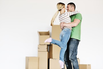 Image showing Young couple moving in new house