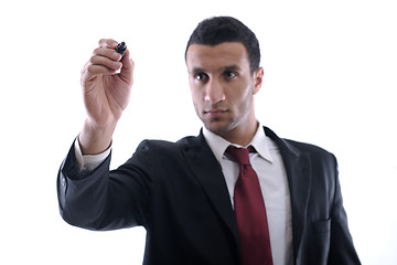 Image showing business man draw with marker on empty space