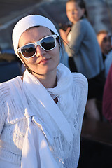 Image showing Greek woman on the streets of Oia, Santorini, Greece