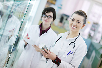 Image showing team of pharmacist chemist woman  in pharmacy drugstore