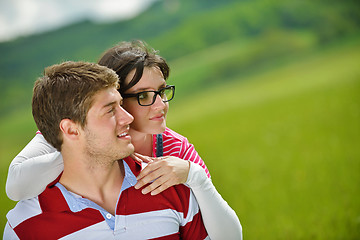 Image showing Portrait of romantic young couple smiling together outdoor