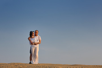 Image showing couple enjoying the sunset