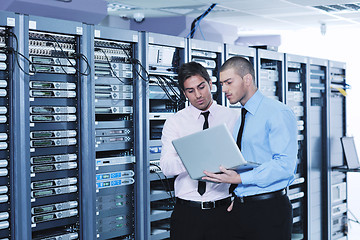 Image showing it enineers in network server room