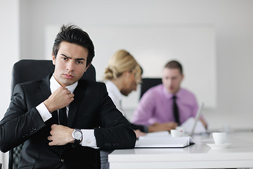 Image showing young business man at meeting