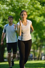 Image showing Young couple jogging