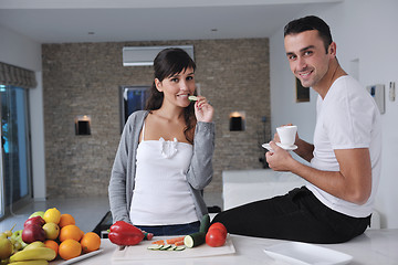 Image showing young couple have fun in modern kitchen