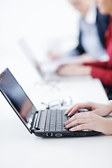 Image showing business woman group with headphones