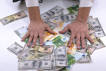 Image showing Business man holding money