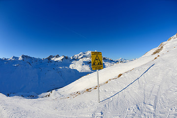 Image showing Sign board at High mountains under snow in the winter