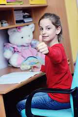 Image showing girl doing homework