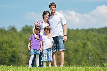 Image showing happy young family have fun outdoors