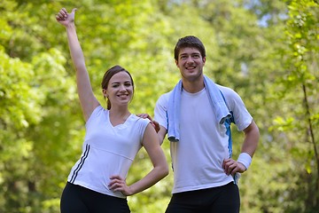 Image showing Young couple jogging