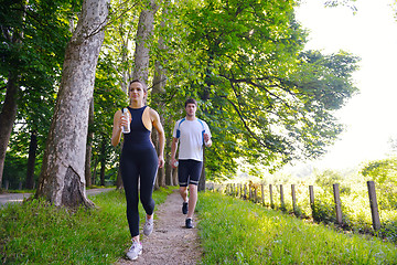 Image showing Young couple jogging