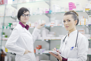 Image showing team of pharmacist chemist woman  in pharmacy drugstore