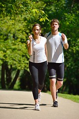 Image showing Young couple jogging