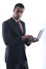 Image showing business man work on mini laptop