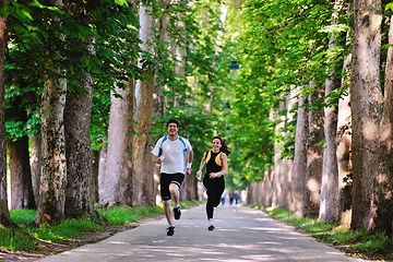 Image showing Young couple jogging